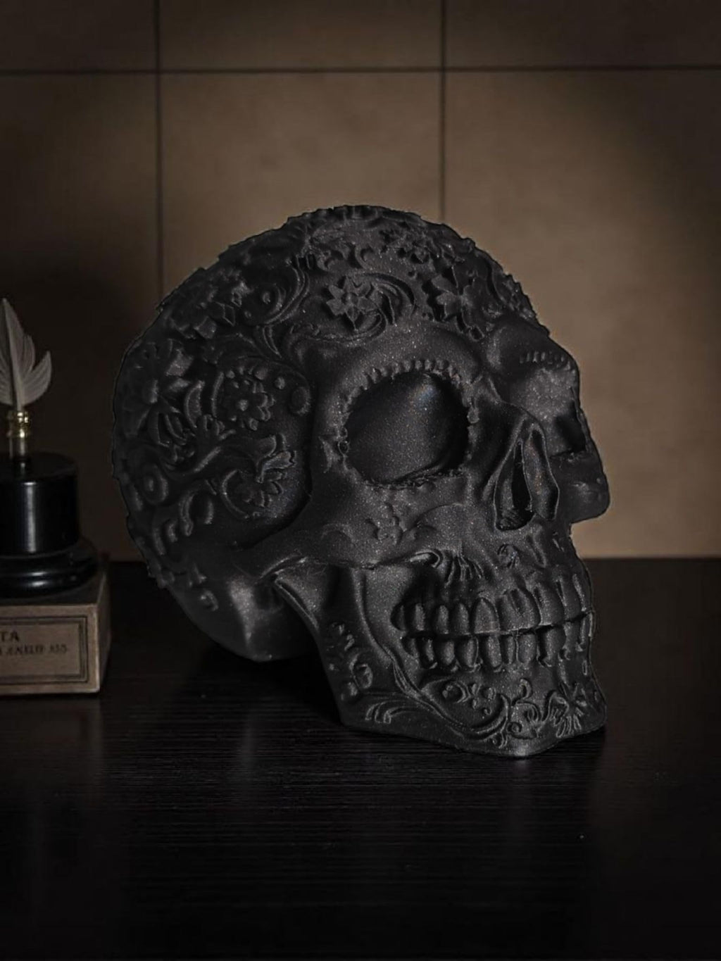 Glossy Black Decorative Skull Statue – Floral Engraved Gothic Skeleton