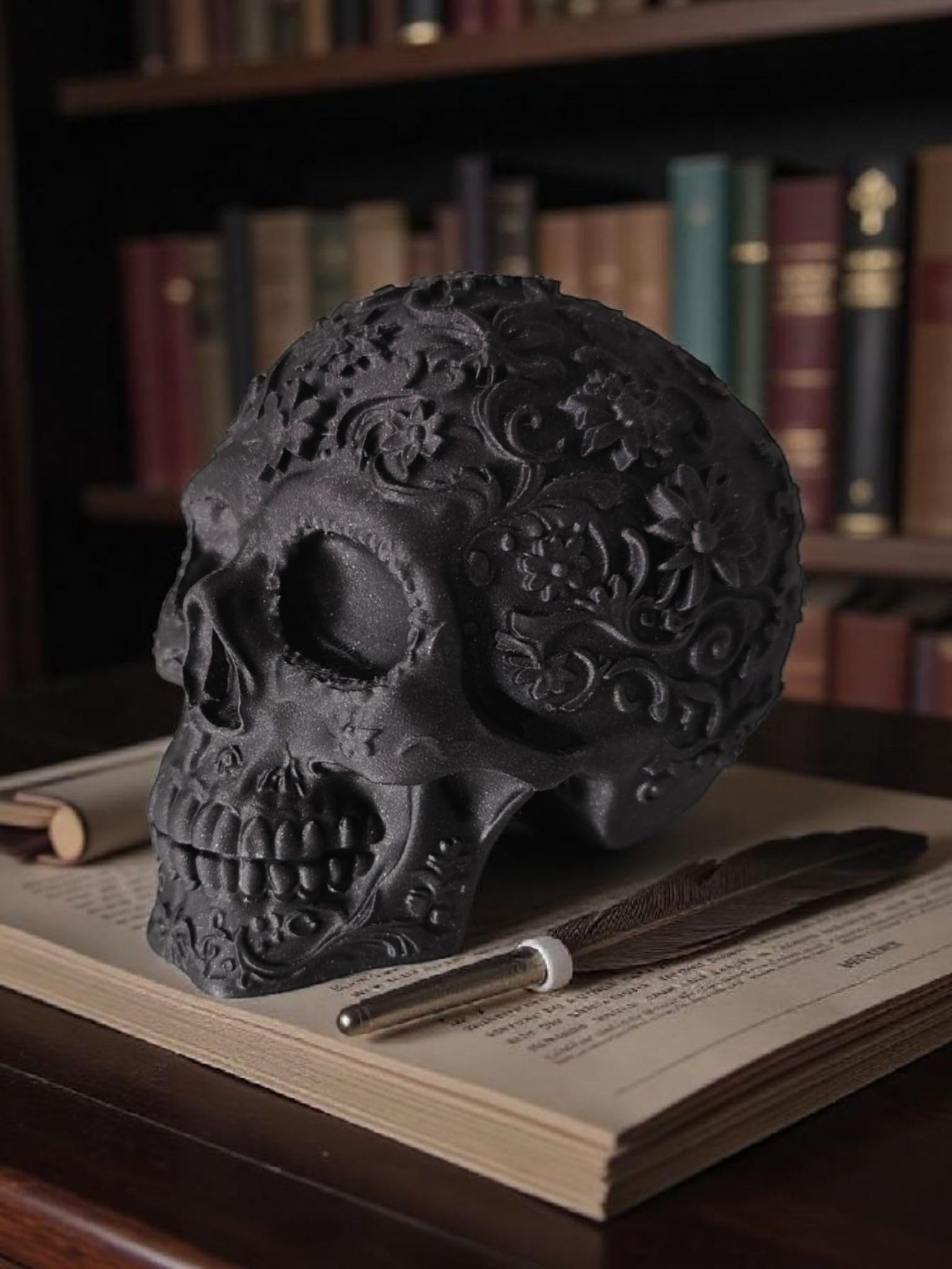 Glossy Black Decorative Skull Statue – Floral Engraved Gothic Skeleton