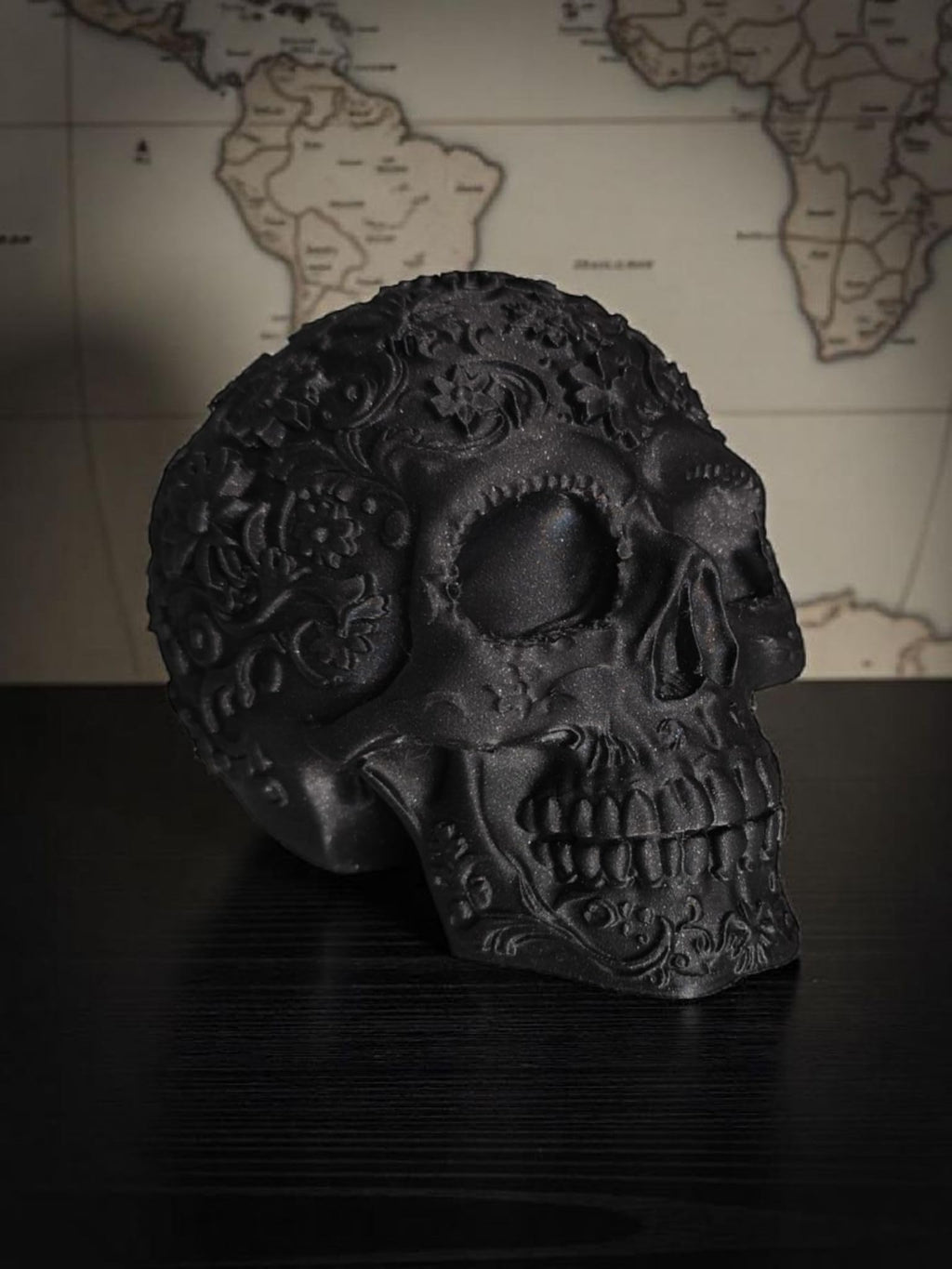 Glossy Black Decorative Skull Statue – Floral Engraved Gothic Skeleton
